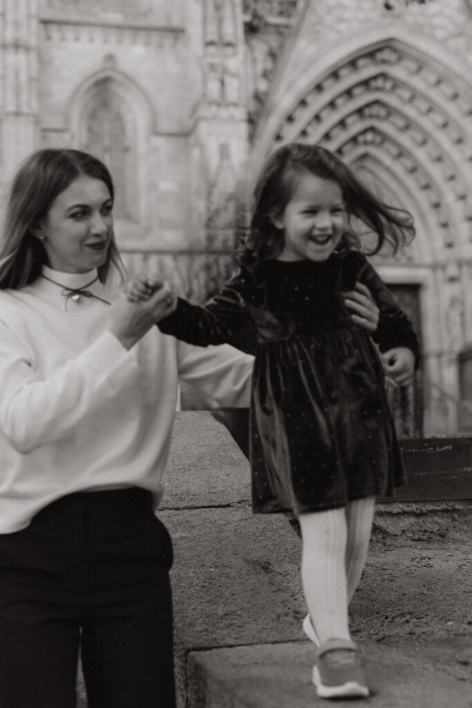 Family smiling near Barcelona Cathedral
